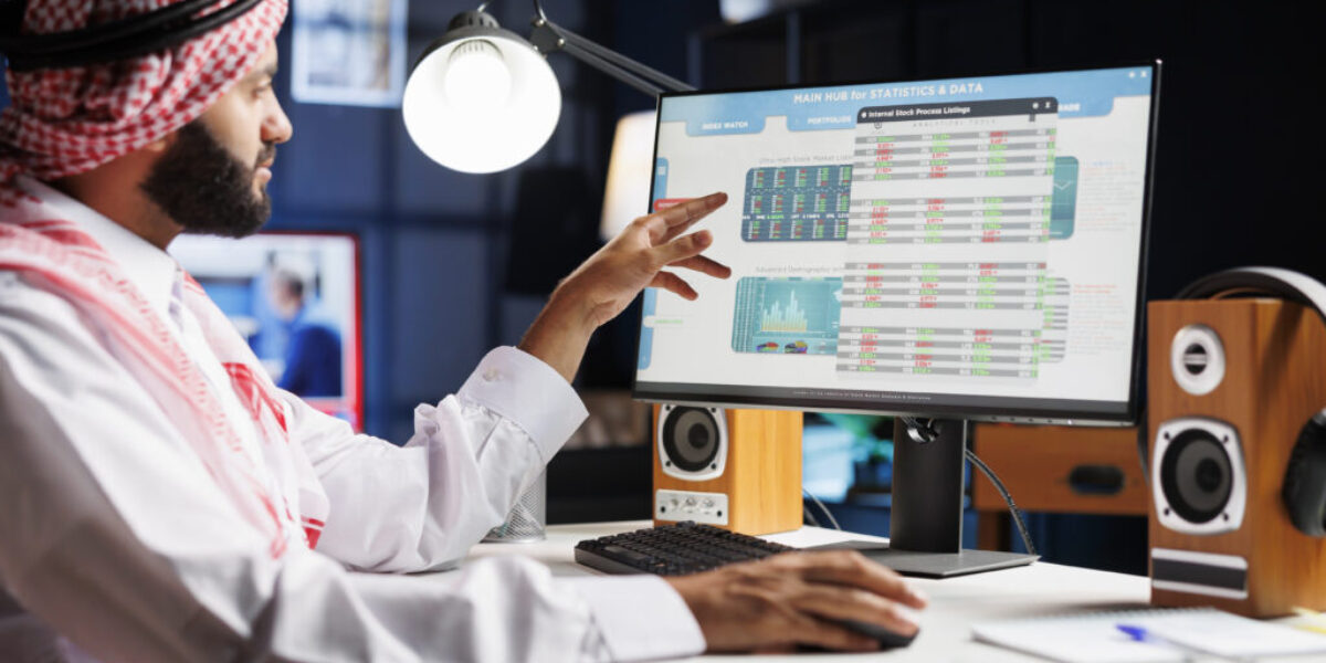 Muslim guy checking charts and data